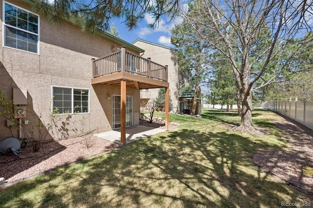 6087 Colony Cir, Colorado Springs, CO 80919 - view of yard featuring a wooden deck and a patio