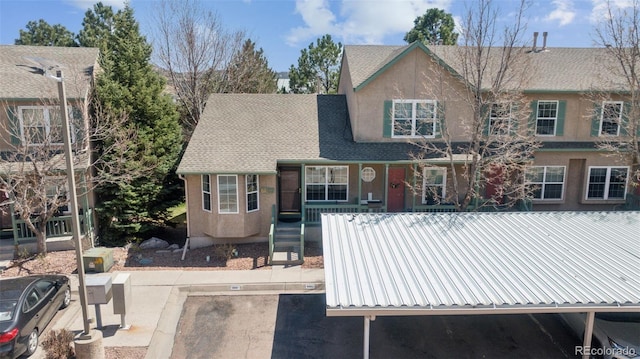 6087 Colony Cir, Colorado Springs, CO 80919 - view of front of property with uncovered parking and metal roof