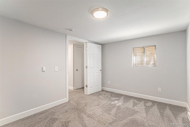 unfurnished bedroom with carpet flooring