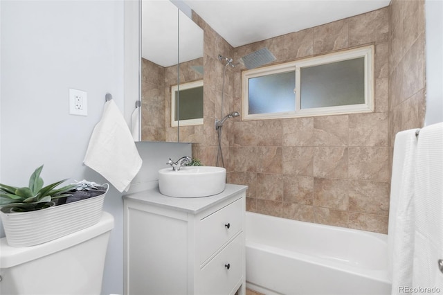 full bathroom with vanity, toilet, and shower / bath combo