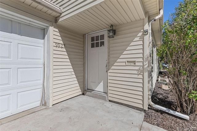 property entrance featuring a garage