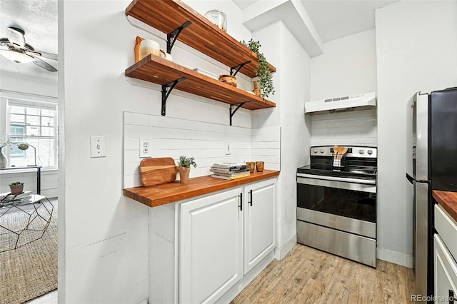 1137 N Sherman St Unit 17, Denver, CO 80203 - kitchen featuring stainless steel appliances, under cabinet range hood, wood counters, backsplash, and open shelves