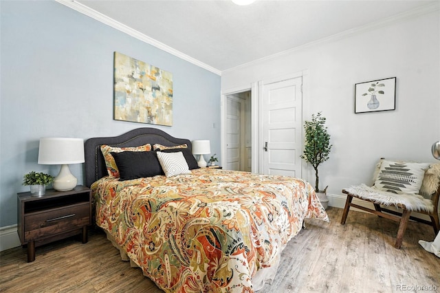 1137 N Sherman St Unit 17, Denver, CO 80203 - bedroom with crown molding and wood finished floors