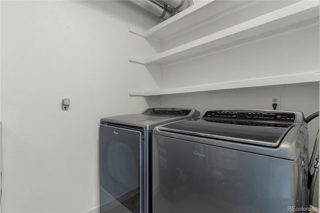 10687 W 107th Ave, Broomfield, CO 80021 - laundry room with separate washer and dryer and baseboards