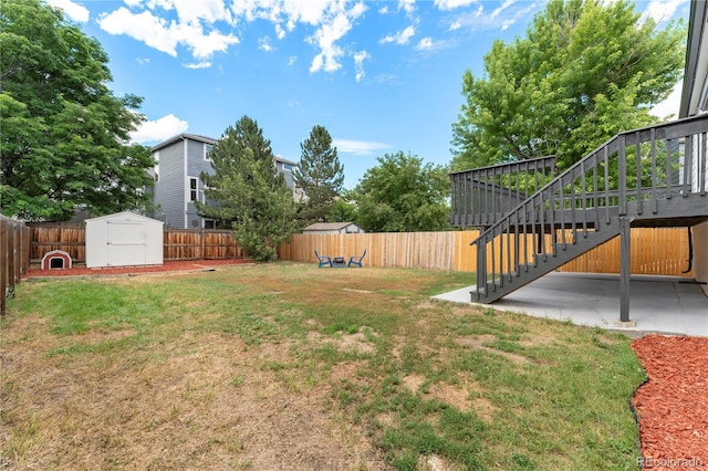 10687 W 107th Ave, Broomfield, CO 80021 - fenced backyard featuring a shed, stairs, and a patio