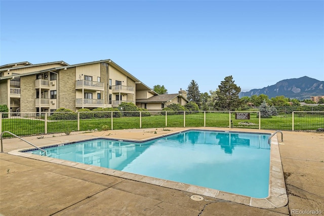 695 Manhattan Dr Unit 109, Boulder, CO 80303 - community pool featuring a mountain view