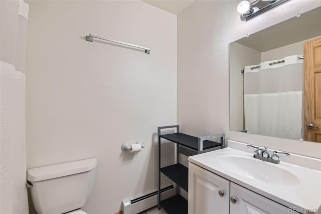 695 Manhattan Dr Unit 109, Boulder, CO 80303 - full bathroom featuring a baseboard radiator, toilet, vanity, and curtained shower