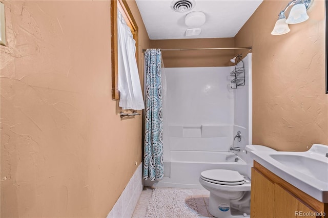 full bathroom with vanity, tile patterned flooring, toilet, and shower / tub combo with curtain