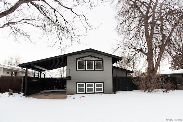 view of snow covered property