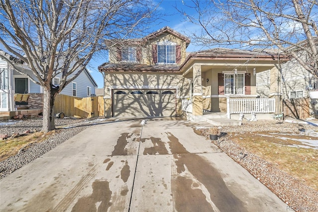 view of front facade featuring a garage and a porch