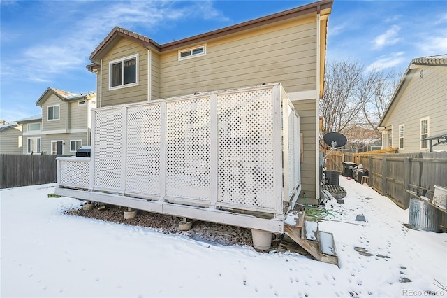 view of snow covered house