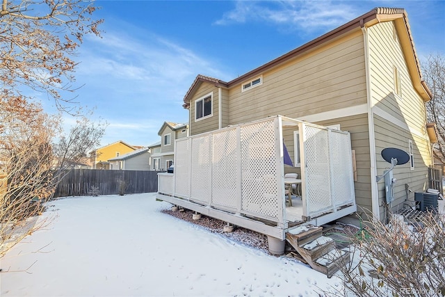 view of snow covered house