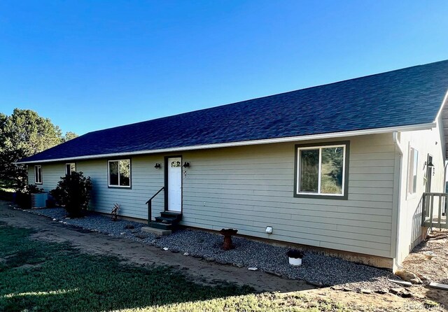 view of front of property with cooling unit