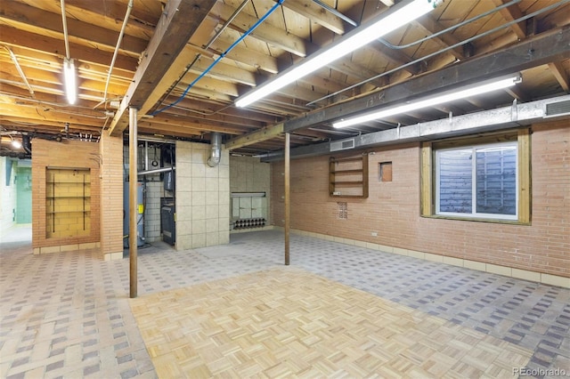 basement featuring water heater