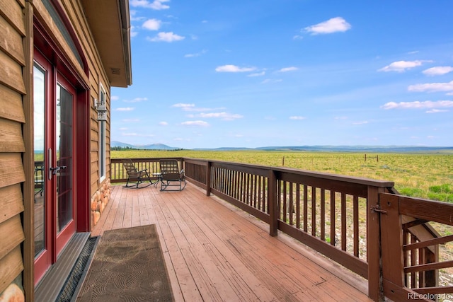 deck featuring a rural view