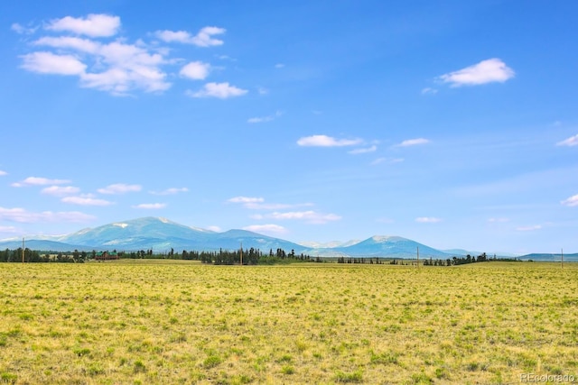 mountain view featuring a rural view