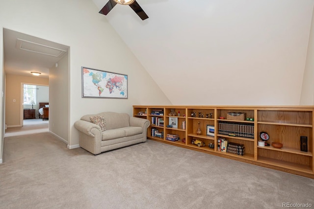 interior space featuring light colored carpet, ceiling fan, and lofted ceiling