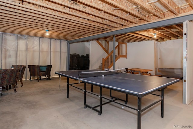 recreation room featuring concrete floors