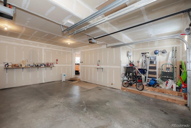 garage featuring a garage door opener