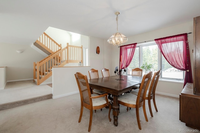 dining space with light colored carpet, an inviting chandelier, baseboards, and stairs