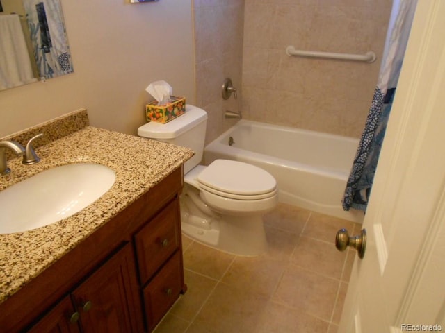 full bathroom featuring tile patterned floors, vanity, toilet, and shower / bath combo