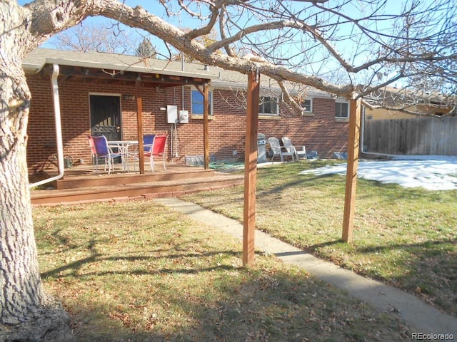 view of yard with a deck