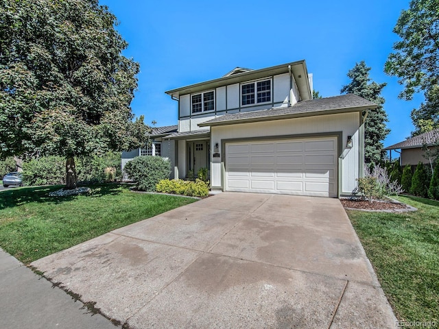 front of property featuring a garage and a front lawn