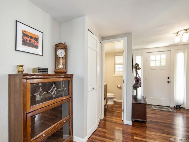 foyer featuring dark hardwood / wood-style floors