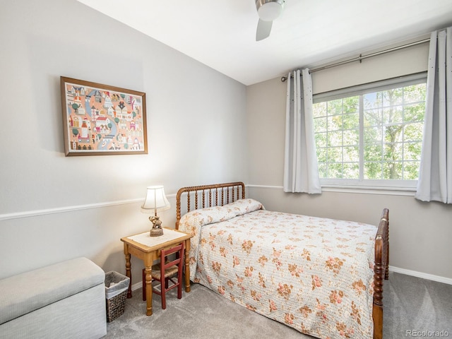 bedroom with ceiling fan and carpet flooring