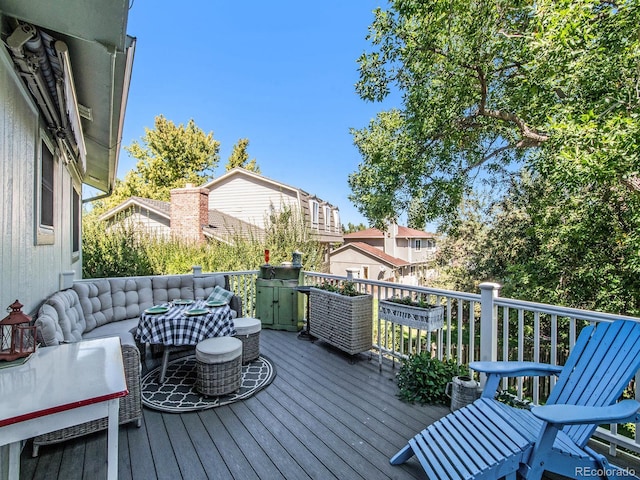 deck with an outdoor living space