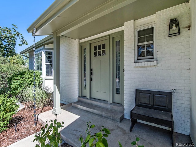 entrance to property with covered porch