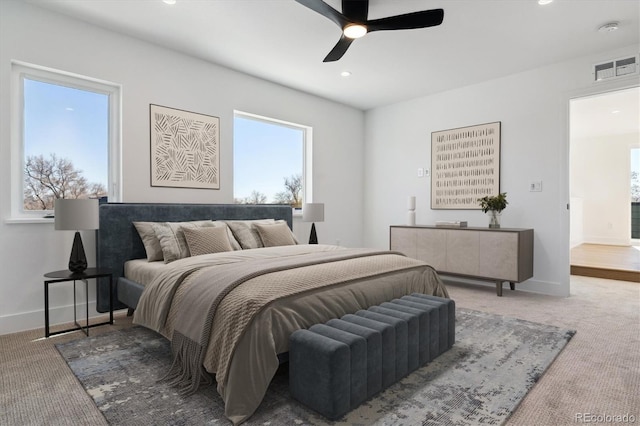 bedroom featuring visible vents, a ceiling fan, recessed lighting, carpet, and baseboards