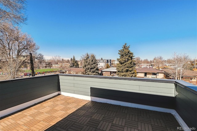 view of patio / terrace featuring a balcony and a residential view