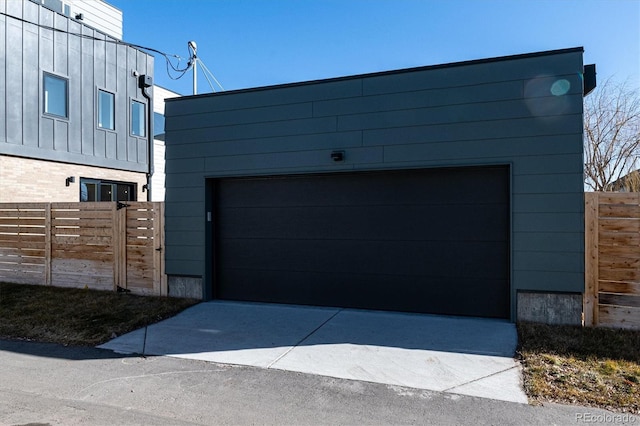 garage featuring fence