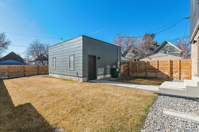 exterior space with a fenced backyard