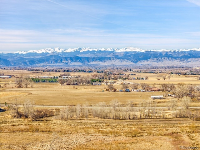 view of mountain feature with a rural view