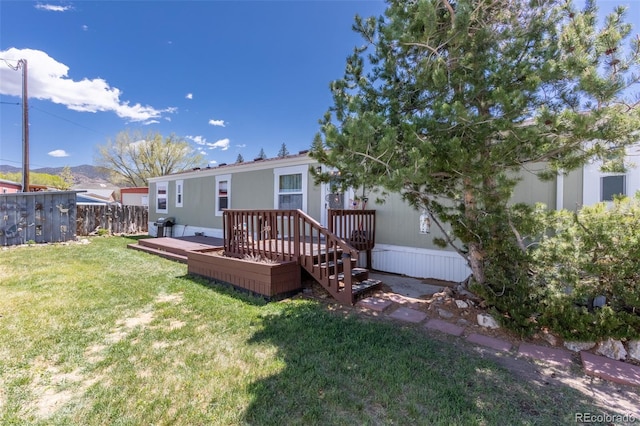 910 J St Unit D1, Salida, CO 81201 - back of house with a wooden deck