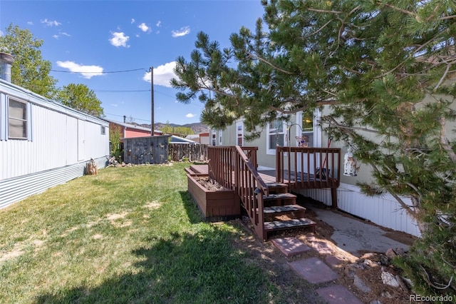 910 J St Unit D1, Salida, CO 81201 - view of yard featuring a wooden deck