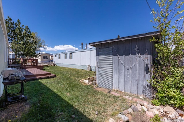 910 J St Unit D1, Salida, CO 81201 - view of grassy yard with a wooden deck