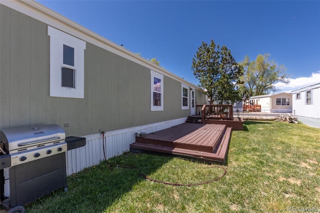 910 J St Unit D1, Salida, CO 81201 - view of grassy yard with a deck