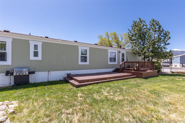 910 J St Unit D1, Salida, CO 81201 - rear view of house featuring a wooden deck