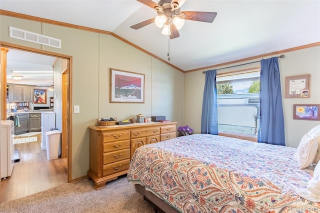 910 J St Unit D1, Salida, CO 81201 - bedroom featuring lofted ceiling, ornamental molding, ceiling fan, and light wood-style floors