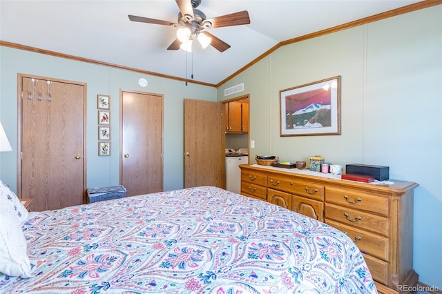 910 J St Unit D1, Salida, CO 81201 - bedroom with washer and clothes dryer, vaulted ceiling, ornamental molding, ceiling fan, and two closets