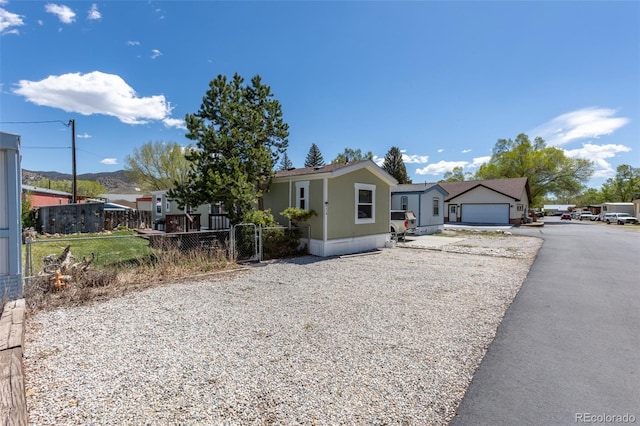 910 J St Unit D1, Salida, CO 81201 - view of front of house featuring a detached garage