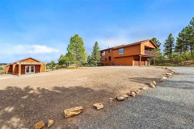2100 Bibles Hill Dr, Franktown, CO 80116 - view of yard featuring french doors and a deck