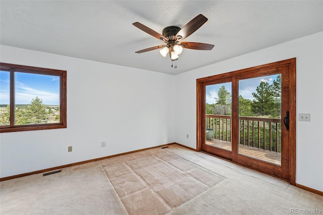 2100 Bibles Hill Dr, Franktown, CO 80116 - spare room with plenty of natural light, baseboards, carpet, and ceiling fan
