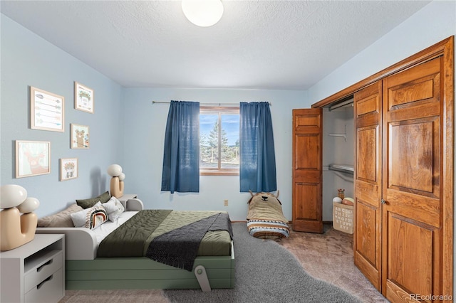 2100 Bibles Hill Dr, Franktown, CO 80116 - bedroom featuring carpet floors and a textured ceiling