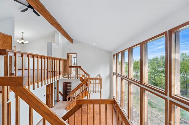 2100 Bibles Hill Dr, Franktown, CO 80116 - hall with an upstairs landing and a chandelier
