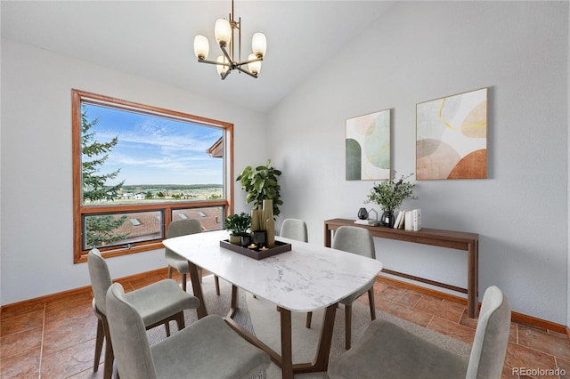2100 Bibles Hill Dr, Franktown, CO 80116 - dining room featuring a chandelier, lofted ceiling, baseboards, and stone tile flooring