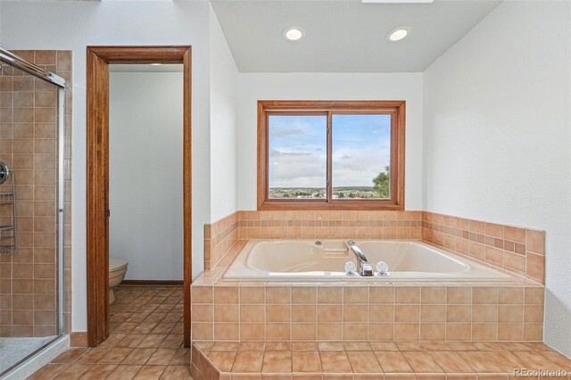 2100 Bibles Hill Dr, Franktown, CO 80116 - bathroom with a shower stall, a garden tub, toilet, tile patterned floors, and recessed lighting